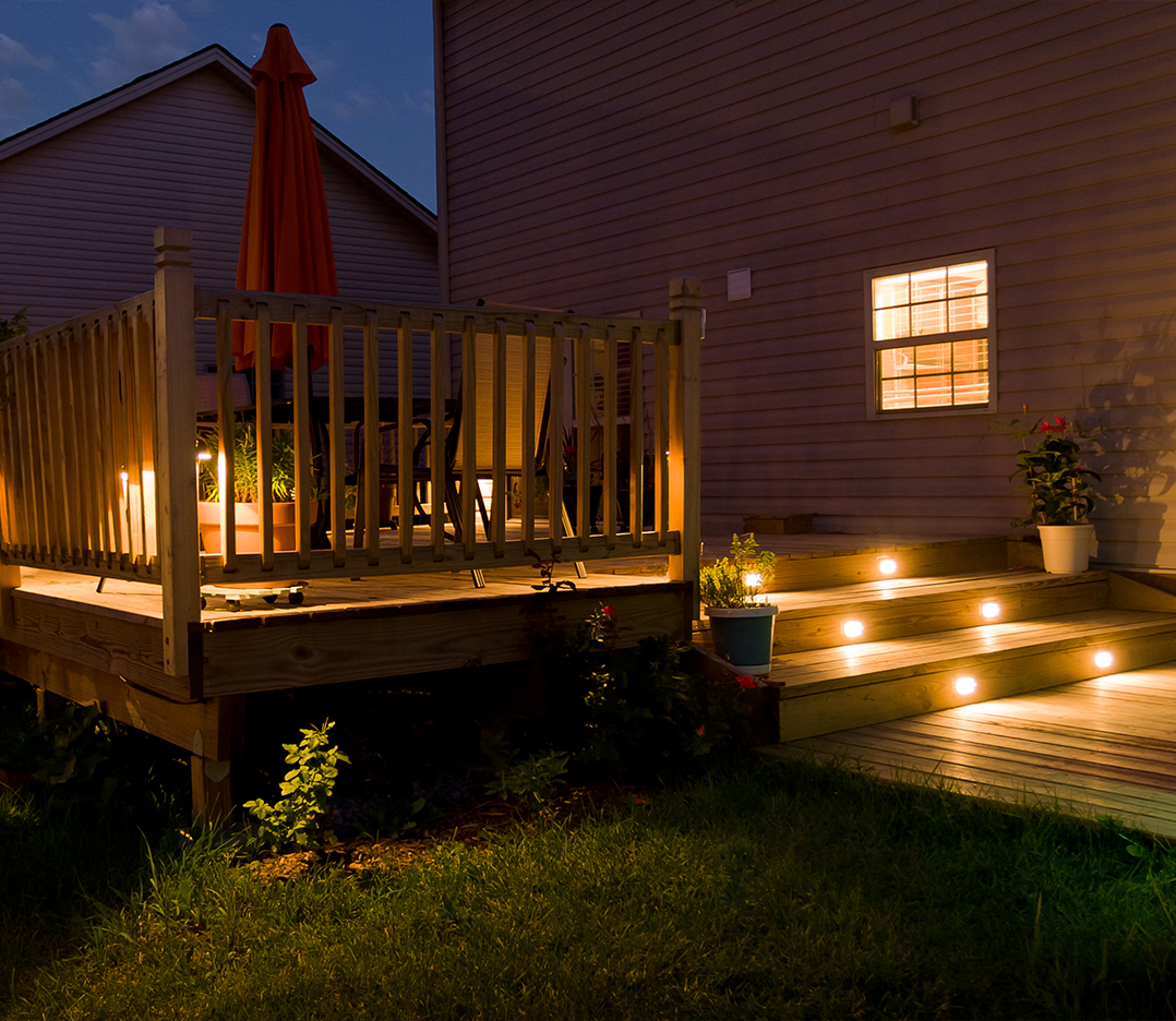a house with trees in the night sky